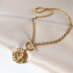 Łańcuch - blaszka z różą wiatrów