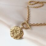 Łańcuch - blaszka z różą wiatrów