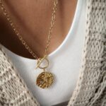 Łańcuch - blaszka z różą wiatrów